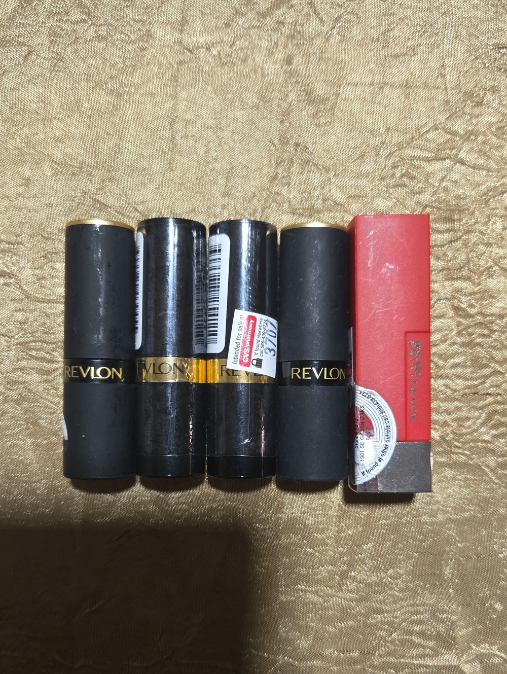 Revlon Lipsticks And A Maybelline Lupstick